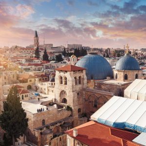 Panoramic aerial view of the Temple of the Holy Sepulcher at sunset in the old city of Jerusalem, Christian quarter, Israel